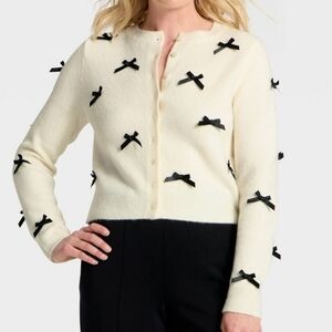A New Day Women's Cream Sweater with Black Bow Accents